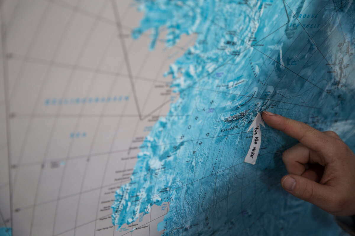 Finger points to the location of Union Glacier on map